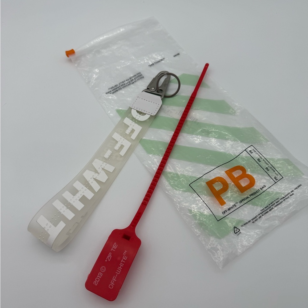 Off-White Keychain with White and Silver Accents